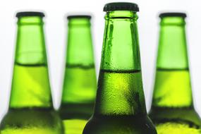 Alcoholic green glass bottles