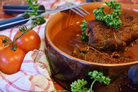 meat rolls in a clay plate