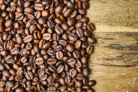 coffee beans on the wooden surface