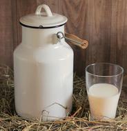 Milk in vintage enamel Can and Glass