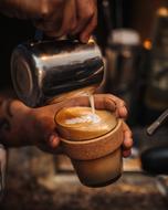 barista preparing latte
