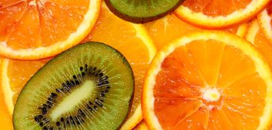 slices of Orange and Kiwi, background