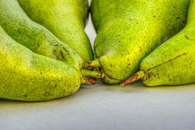 macro photo of green pears on the table