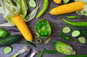 green vegetables and corn on the table