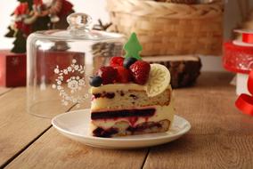 Sweet sponge cake with jam and berries