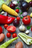 colorful raw Vegetables on grey wooden table