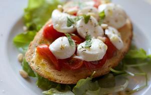 bruschetta topped with tomato