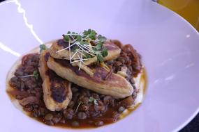 sausages with lentils on a plate