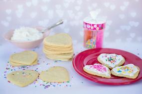 Decorating of heart cookies to valentine's day