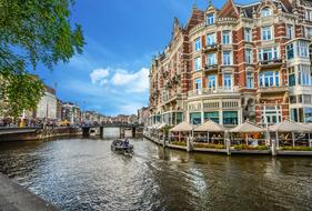 tourist boat on a canal in Amsterdam