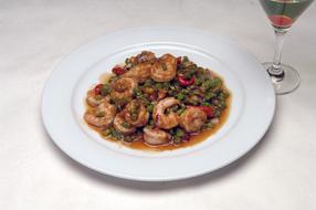 shrimp with lentils and cocktail in a glass