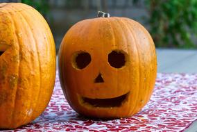 carved face in a pumpkin for the holiday