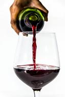 pour wine into a glass