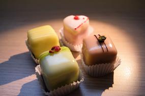 four marzipan sweets on the table