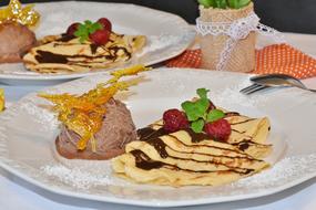 Pancakes with ice cream and colorful decorations