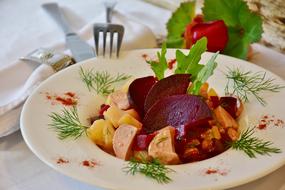 potato salad with pickled beets and arugula