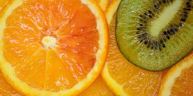 macro photo of chopped oranges and kiwi