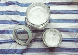 coconut oil in a transparent glass jar
