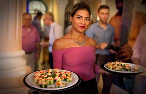 waitress with dishes in a restaurant in cuba