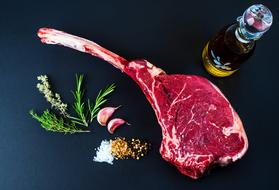 T-bone steak, seasoning and olive oil