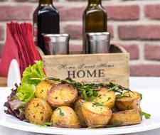 baked potato with hers and spices