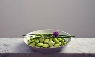 beans and green onions in a plate