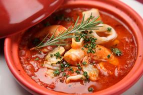 vegetable Soup in red Bowl