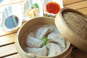 steamed chinese dumplings in a basket