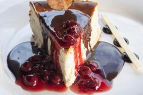 piece of cake with berry jam on a plate