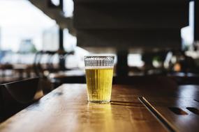 closeup picture of Beer in Glass on table in Pub