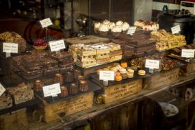 delicious chocolate desserts on display in a pastry shop