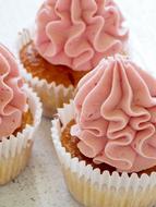 cupcakes with pink cream for birthday