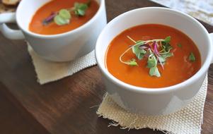 Tomato Soup in white bowls, Healthy food