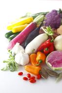 Variety of fresh vegetables on white