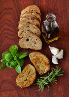 homemade bread, basil, rosemary and olive oil