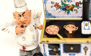 Star Chef at stove, vintage figurine