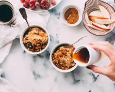 Colorful and beautiful food in the bowls with cutlery