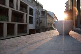 beam of morning sun on Coffee cup