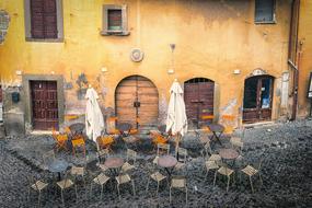 street terrace of a restaurant in the historic center in Italy