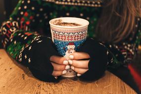 Christmas Logo Cup hands