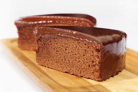 swedish chocolate cake on a wooden cutting board
