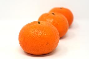 three Tangerines, orange Fruits