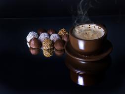 delicious chocolates and a cup of hot chocolate