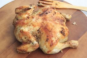 Roasted Whole Chicken on wooden tray