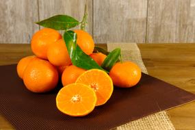 Tangerines and Clementines and Oranges on the table