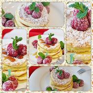 Colorful and beautiful schaumomelette with the raspberries, mint and powder