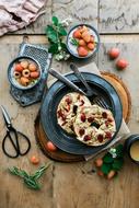 Beautiful and colorful dishes with vegetables on the wooden table