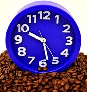 Coffee Break, clock on pile of beans