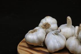 White Garlic on Chopping Board