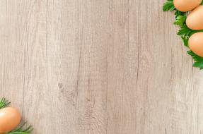 eggs as decoration on wooden background